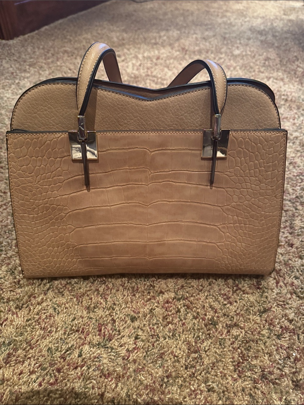 Tan hand bag